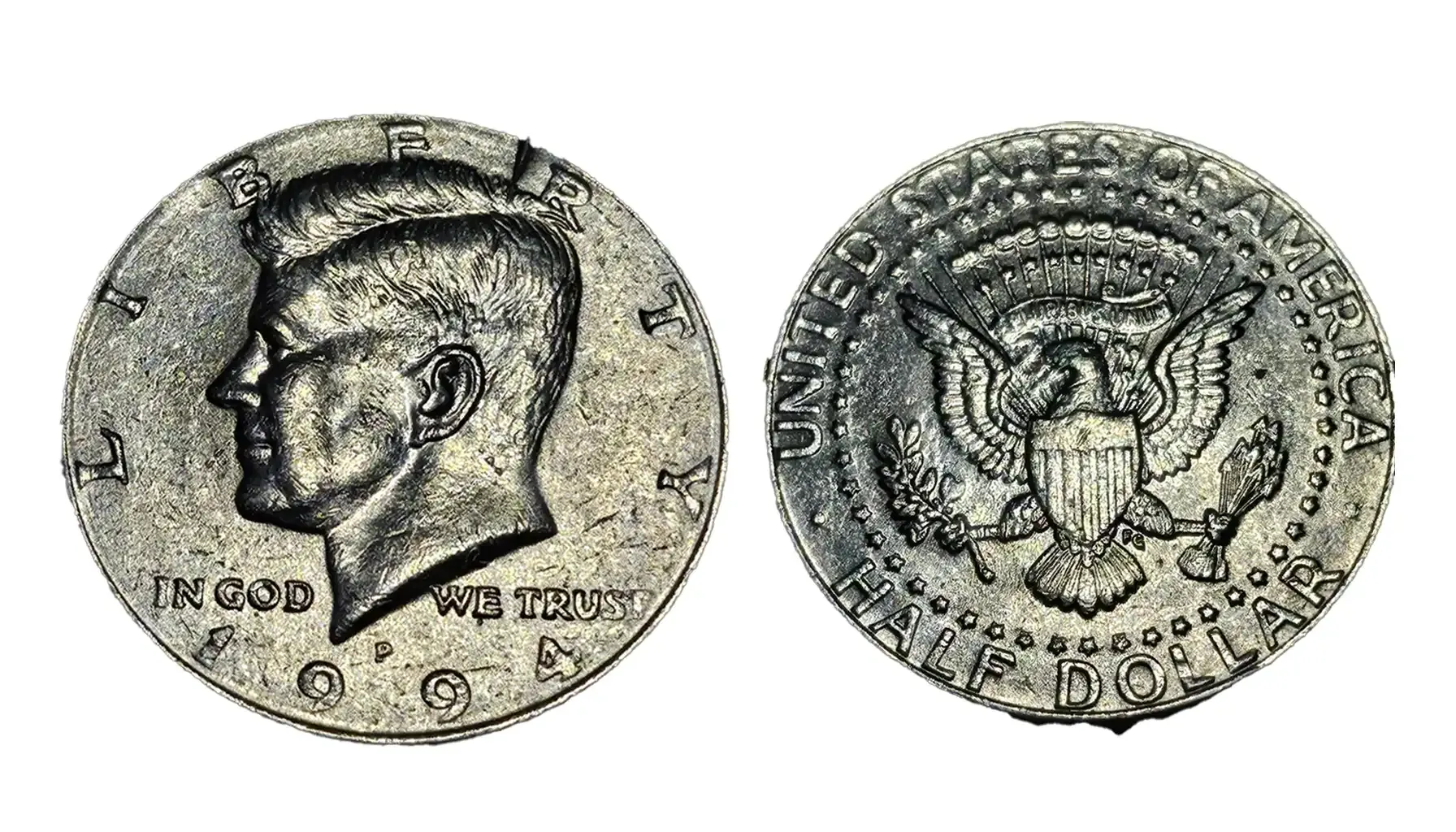Group of 1994 Kennedy half dollar coins showing all mint mark varieties: P, D, and S proof issues