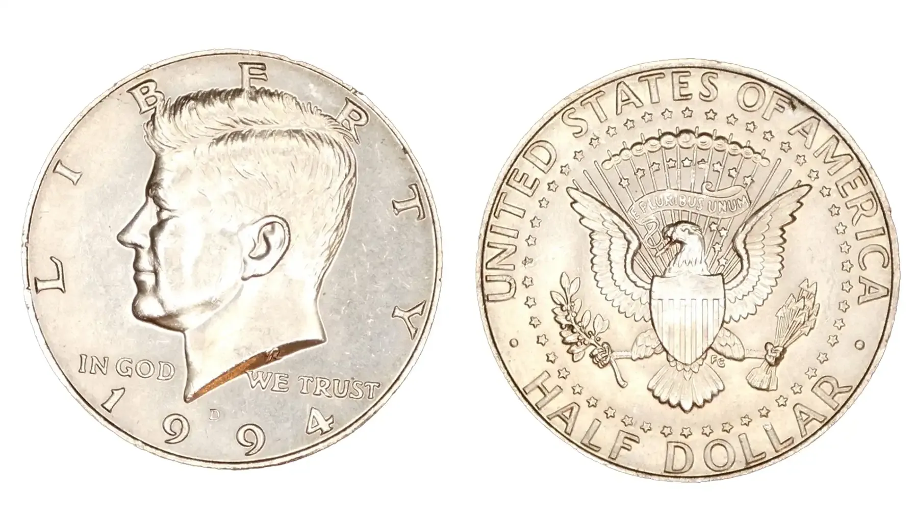 Grading strip showing four 1994 Kennedy half dollars from worn circulated condition through gem uncirculated MS67 quality